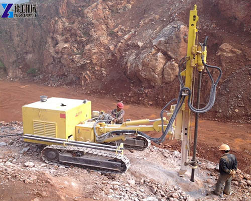 down-the-hole drill rig working in open pit mine