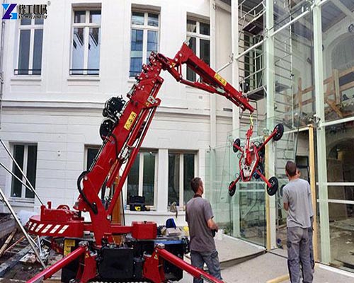 mobile spider crane operator controlling